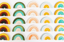 Load image into Gallery viewer, Rainbow wall hook, suspend.it screw cover, suspend.it nail cover, rainbow nursery decor, ceramic rainbow